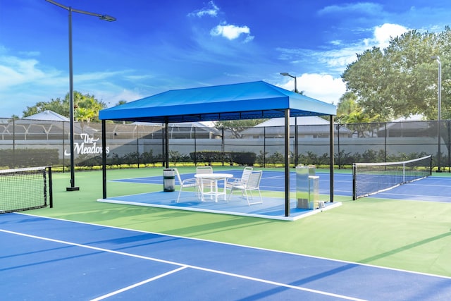 2608 SW Greenwich Way, Palm City, FL 34990 - view of tennis court featuring community basketball court