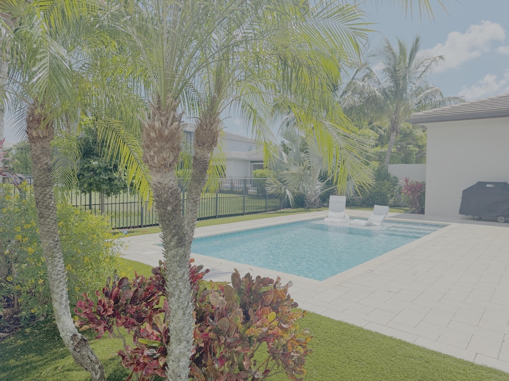 8575 Dearborn River Way, Boca Raton, FL 33496 - view of swimming pool featuring a patio area