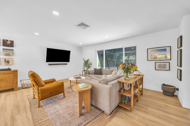 354 Country Club Dr, Tequesta, FL 33469 - living area featuring light wood-style floors, recessed lighting, and baseboards
