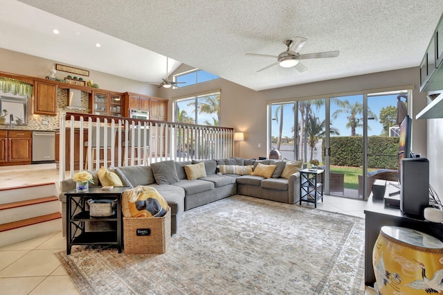 1503 NW 159th Ln, Pembroke Pines, FL 33028 - living area featuring light tile patterned floors, ceiling fan, and a textured ceiling