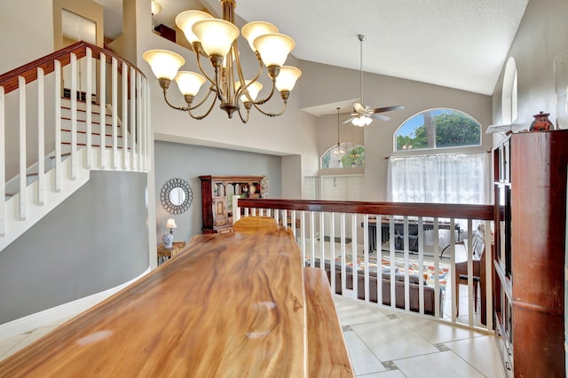 1503 NW 159th Ln, Pembroke Pines, FL 33028 - corridor featuring stairs, a chandelier, tile patterned flooring, and high vaulted ceiling