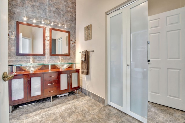 1503 NW 159th Ln, Pembroke Pines, FL 33028 - bathroom featuring double vanity, baseboards, and tile patterned flooring