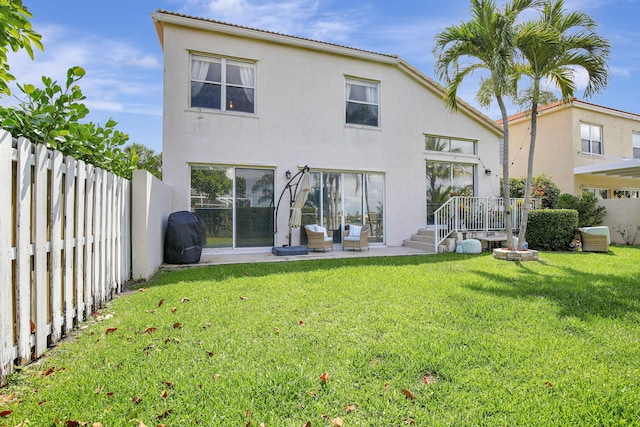 1503 NW 159th Ln, Pembroke Pines, FL 33028 - back of property with stucco siding and a patio