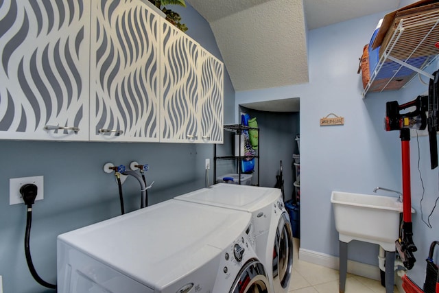 1503 NW 159th Ln, Pembroke Pines, FL 33028 - washroom with independent washer and dryer, cabinet space, light tile patterned floors, and baseboards