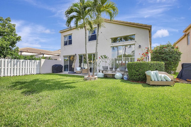 1503 NW 159th Ln, Pembroke Pines, FL 33028 - rear view of property featuring stucco siding and a patio