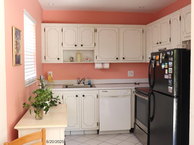 716 Saxony O Unit 716, Delray Beach, FL 33446 - kitchen featuring freestanding refrigerator, white dishwasher, stainless steel electric stove, and healthy amount of natural light