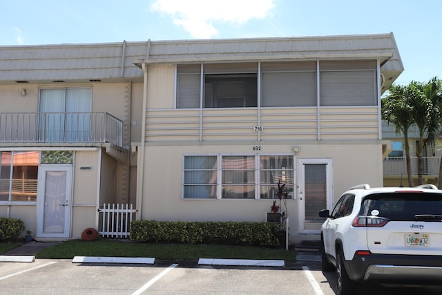 716 Saxony O Unit 716, Delray Beach, FL 33446 - view of property featuring uncovered parking