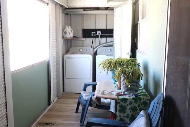 716 Saxony O Unit 716, Delray Beach, FL 33446 - laundry room featuring separate washer and dryer, light wood-type flooring, and plenty of natural light