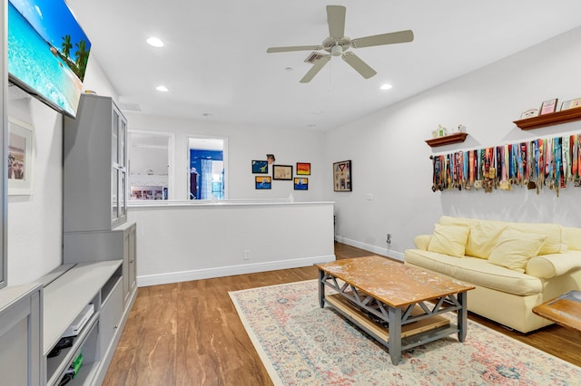 49 Lancaster Rd, Boynton Beach, FL 33426 - living room with wood finished floors, a ceiling fan, and recessed lighting