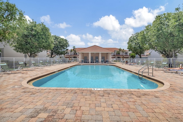 49 Lancaster Rd, Boynton Beach, FL 33426 - community pool featuring a patio