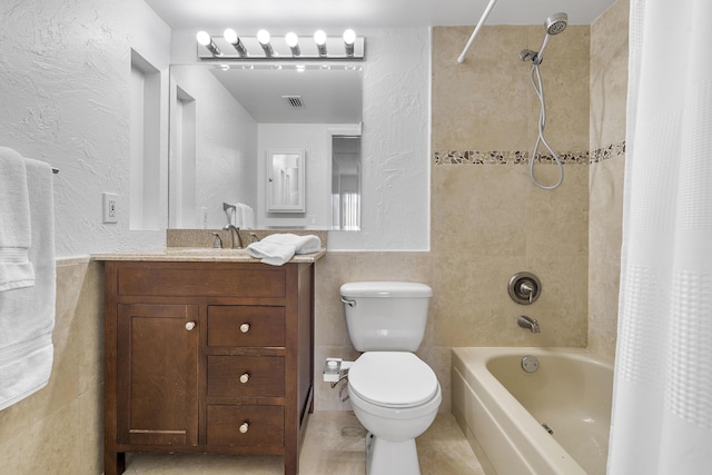 6612 Spring Bottom Way Unit 186, Boca Raton, FL 33433 - bathroom featuring toilet, shower / bathtub combination with curtain, vanity, tile walls, and a textured wall