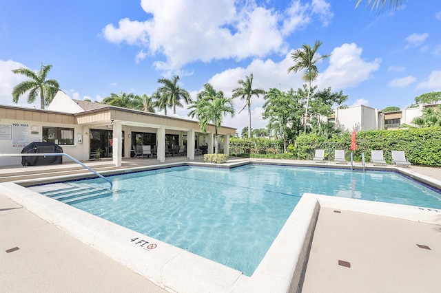 6612 Spring Bottom Way Unit 186, Boca Raton, FL 33433 - community pool featuring a grill and a patio