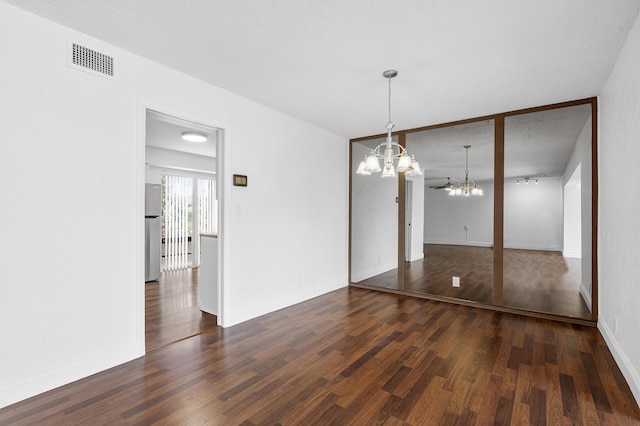 6612 Spring Bottom Way Unit 186, Boca Raton, FL 33433 - unfurnished room featuring a chandelier, wood finished floors, and baseboards