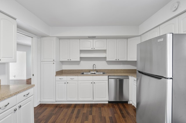 6612 Spring Bottom Way Unit 186, Boca Raton, FL 33433 - kitchen featuring appliances with stainless steel finishes, a sink, dark wood-style floors, and white cabinets