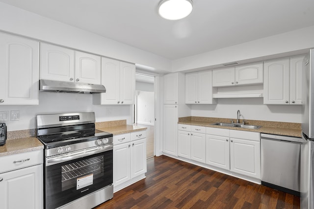 6612 Spring Bottom Way Unit 186, Boca Raton, FL 33433 - kitchen featuring stainless steel appliances, under cabinet range hood, a sink, and dark wood finished floors