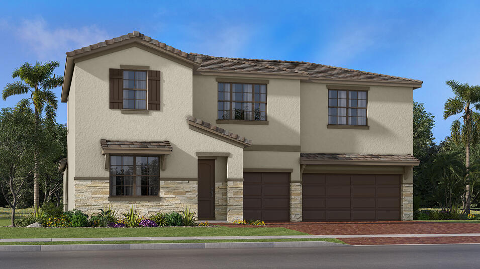 6783 Cobia Cir, Boynton Beach, FL 33437 - view of front facade with stone siding, an attached garage, stucco siding, and driveway