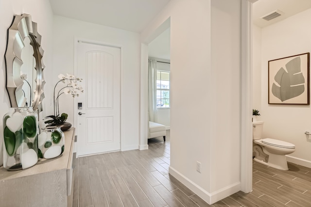 6783 Cobia Cir, Boynton Beach, FL 33437 - entryway with wood finish floors and baseboards