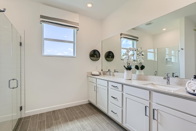 6783 Cobia Cir, Boynton Beach, FL 33437 - full bathroom featuring double vanity, a stall shower, and recessed lighting