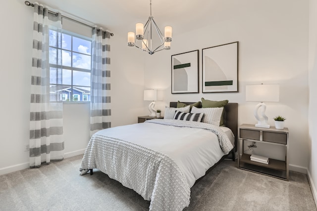 6783 Cobia Cir, Boynton Beach, FL 33437 - carpeted bedroom with a chandelier and baseboards