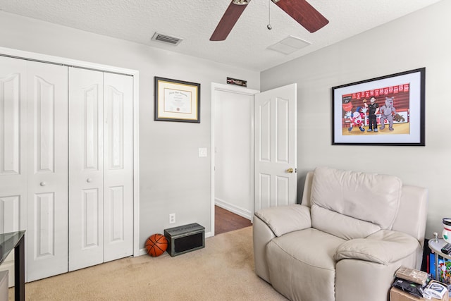 1262 SW Hunnicut Ave, Port Saint Lucie, FL 34953 - living area with a ceiling fan and carpet flooring