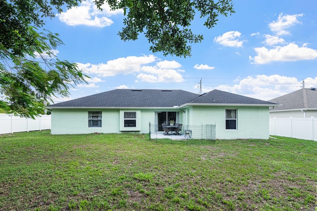 1262 SW Hunnicut Ave, Port Saint Lucie, FL 34953 - back of house with a patio and stucco siding