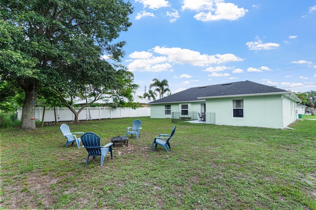 1262 SW Hunnicut Ave, Port Saint Lucie, FL 34953 - view of yard with a fire pit