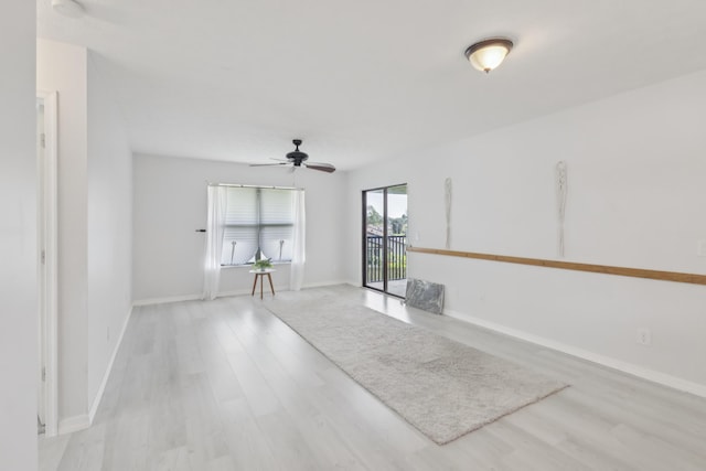 6537 SE Federal Hwy Unit 202, Stuart, FL 34997 - unfurnished room with light wood finished floors, ceiling fan, and baseboards