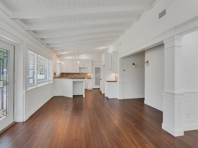 3416 Atlantic Blvd, Vero Beach, FL 32960 - unfurnished living room featuring dark wood finished floors, a sink, wooden ceiling, and ornate columns