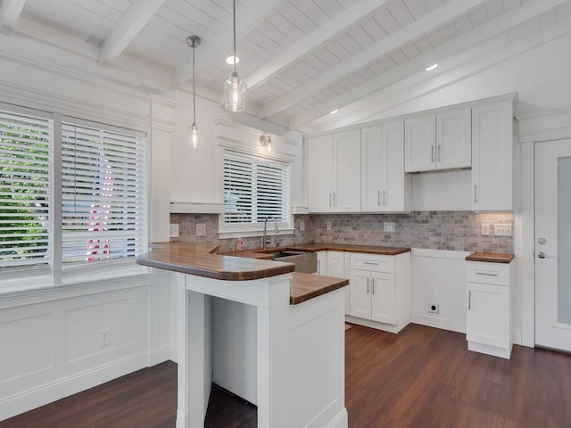 3416 Atlantic Blvd, Vero Beach, FL 32960 - kitchen featuring a sink, dark wood-style flooring, wooden counters, decorative backsplash, and wood ceiling