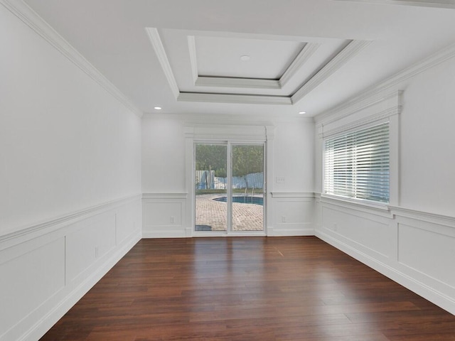 3416 Atlantic Blvd, Vero Beach, FL 32960 - unfurnished room featuring ornamental molding, a raised ceiling, wood finished floors, wainscoting, and recessed lighting