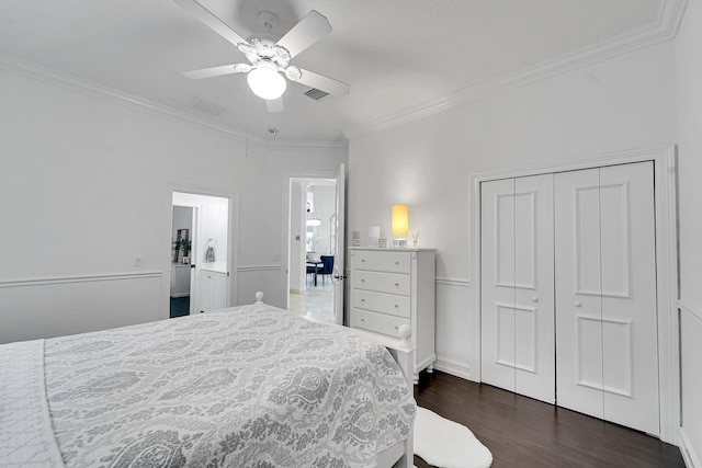 5036 NW 24th Cir, Boca Raton, FL 33431 - bedroom with crown molding, dark wood finished floors, a closet, and a ceiling fan