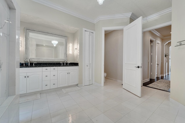 5036 NW 24th Cir, Boca Raton, FL 33431 - full bath featuring vanity, crown molding, toilet, baseboards, and tile patterned floors