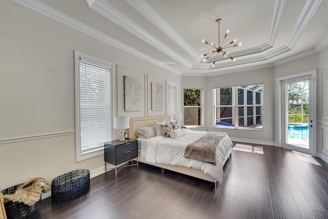 5036 NW 24th Cir, Boca Raton, FL 33431 - bedroom with access to outside, a chandelier, dark wood-type flooring, ornamental molding, and a tray ceiling