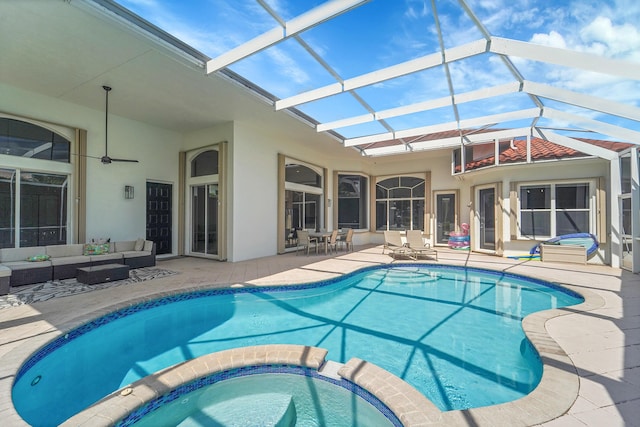 5036 NW 24th Cir, Boca Raton, FL 33431 - view of pool with an outdoor hangout area, a patio area, a pool with connected hot tub, outdoor dining area, and a lanai
