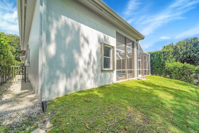 5036 NW 24th Cir, Boca Raton, FL 33431 - rear view of house with stucco siding and a lanai