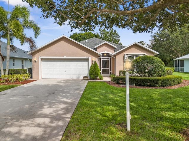 462 SW Sundance Trl, Port Saint Lucie, FL 34953 - single story home with stucco siding, a garage, driveway, and a front yard