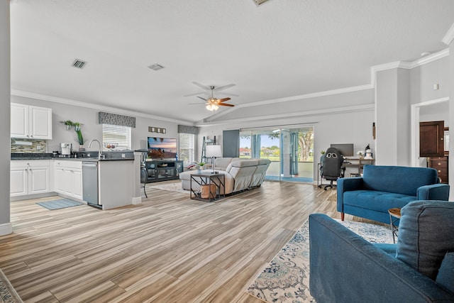 462 SW Sundance Trl, Port Saint Lucie, FL 34953 - living area with a desk, a ceiling fan, light wood-type flooring, crown molding, and baseboards