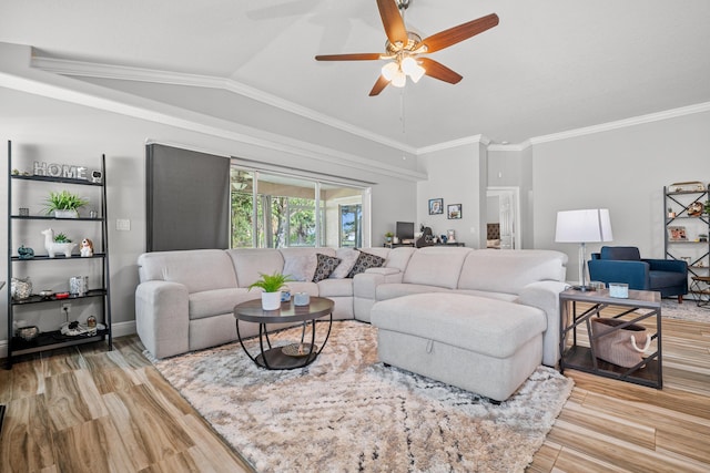 462 SW Sundance Trl, Port Saint Lucie, FL 34953 - living room with wood finished floors, vaulted ceiling, a ceiling fan, and crown molding
