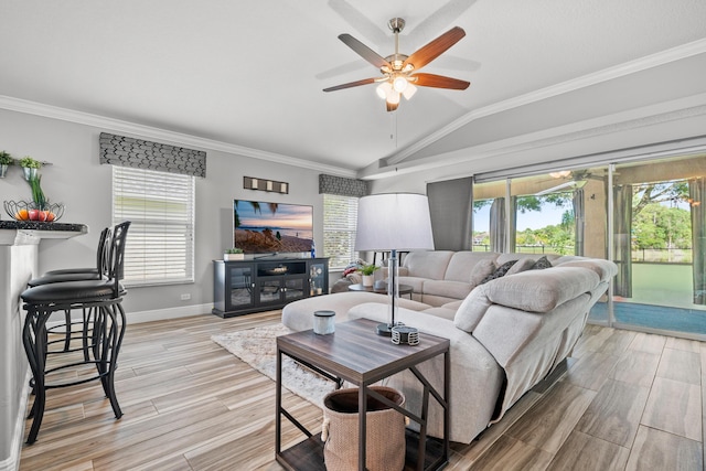 462 SW Sundance Trl, Port Saint Lucie, FL 34953 - living area with vaulted ceiling, ceiling fan, light wood finished floors, plenty of natural light, and ornamental molding
