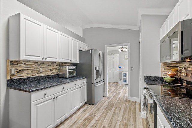 462 SW Sundance Trl, Port Saint Lucie, FL 34953 - kitchen with appliances with stainless steel finishes, crown molding, and white cabinets