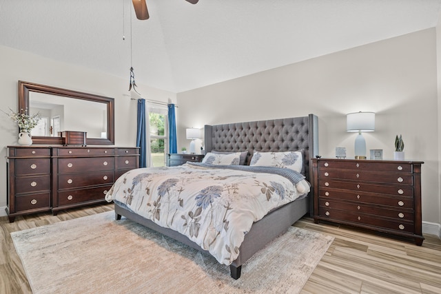 462 SW Sundance Trl, Port Saint Lucie, FL 34953 - bedroom with wood finished floors, a ceiling fan, baseboards, and lofted ceiling