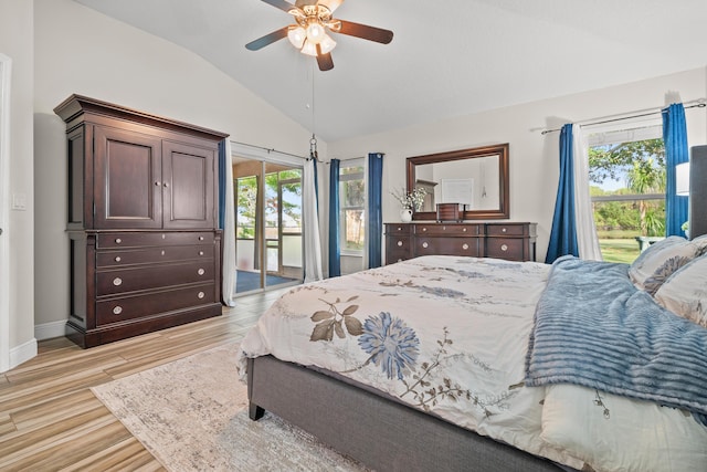 462 SW Sundance Trl, Port Saint Lucie, FL 34953 - bedroom featuring access to outside, lofted ceiling, light wood-style flooring, a ceiling fan, and baseboards