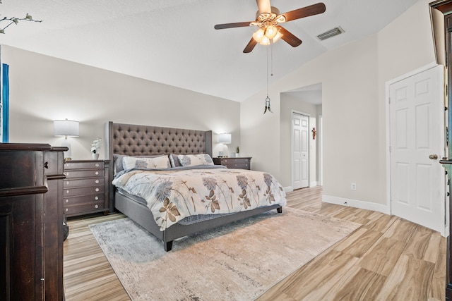 462 SW Sundance Trl, Port Saint Lucie, FL 34953 - bedroom with lofted ceiling, light wood-style floors, baseboards, and ceiling fan