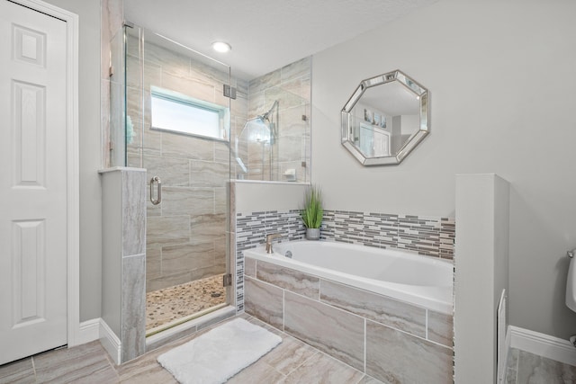 462 SW Sundance Trl, Port Saint Lucie, FL 34953 - full bathroom featuring a garden tub and a shower stall
