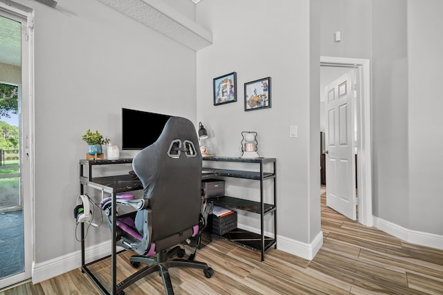 462 SW Sundance Trl, Port Saint Lucie, FL 34953 - office area featuring baseboards and wood finished floors