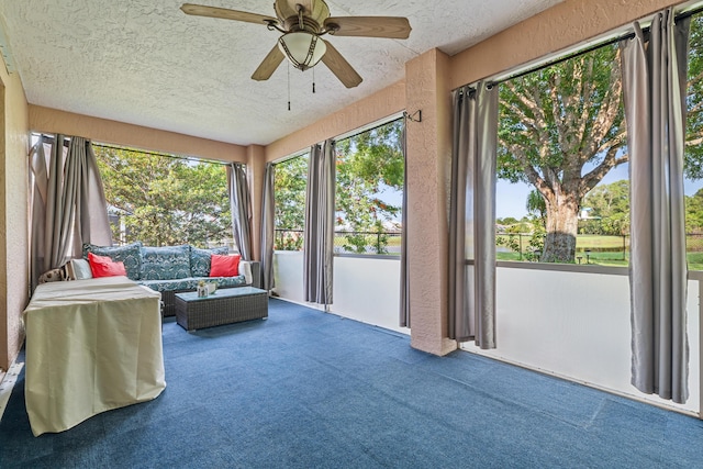 462 SW Sundance Trl, Port Saint Lucie, FL 34953 - sunroom featuring carpet, a textured ceiling, healthy amount of natural light, and a textured wall