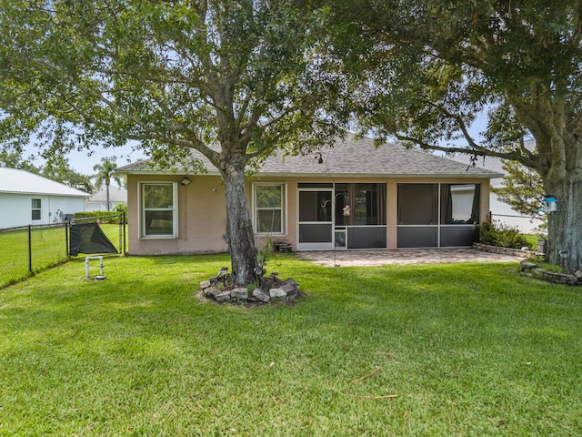 462 SW Sundance Trl, Port Saint Lucie, FL 34953 - back of property with a sunroom and a shingled roof