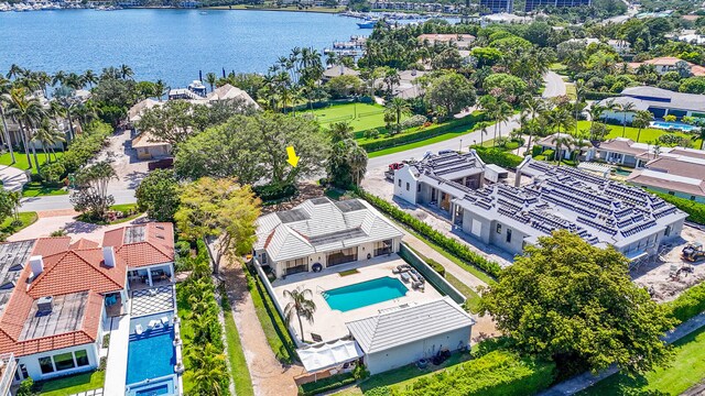 11354 Old Harbour Rd, North Palm Beach, FL 33408 - aerial perspective of suburban area with a nearby body of water and a pool