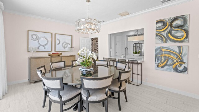 11354 Old Harbour Rd, North Palm Beach, FL 33408 - dining room with a chandelier, crown molding, and baseboards