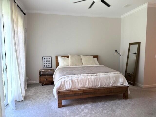 3924 NW 58th St, Boca Raton, FL 33496 - bedroom with crown molding, light colored carpet, baseboards, and a ceiling fan